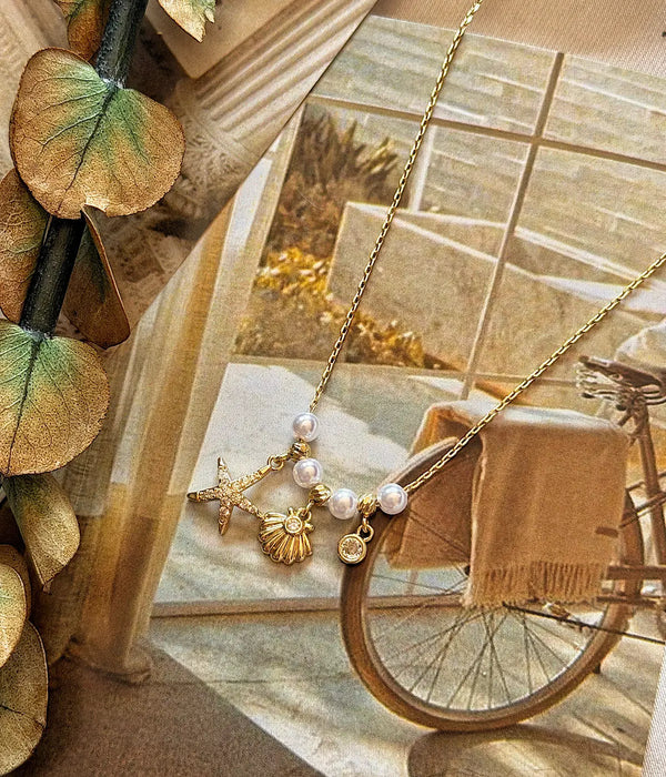 Vintage İnci Detaylı Deniz Yıldızı ve Deniz Kabuğu Gold Kadın Kolye Vintage Aksesuar